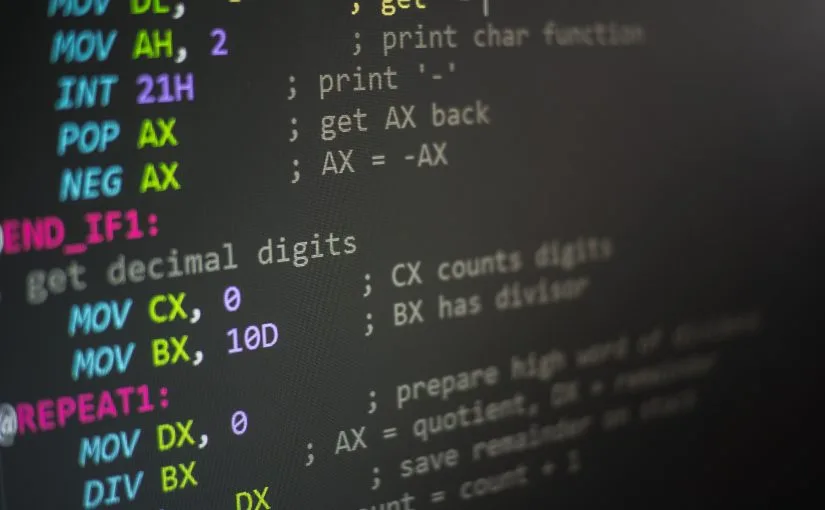 Computer screen displaying lines of code written in Assemby programming language
